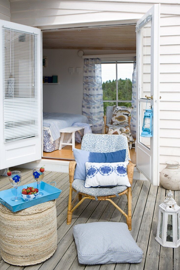 Comfortable seating area on maritime-style wooden terrace