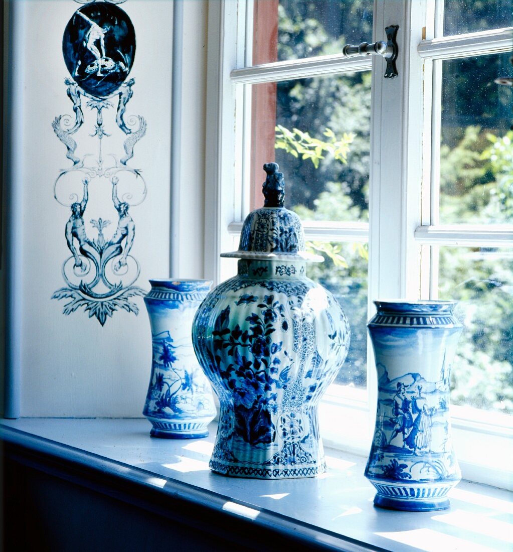 Blue and white painted Chinese vases on windowsill