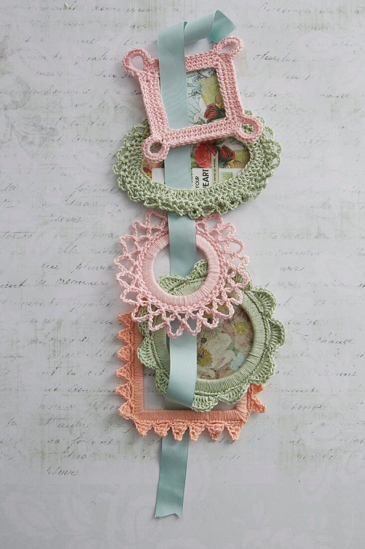 Various pastel crocheted picture frames