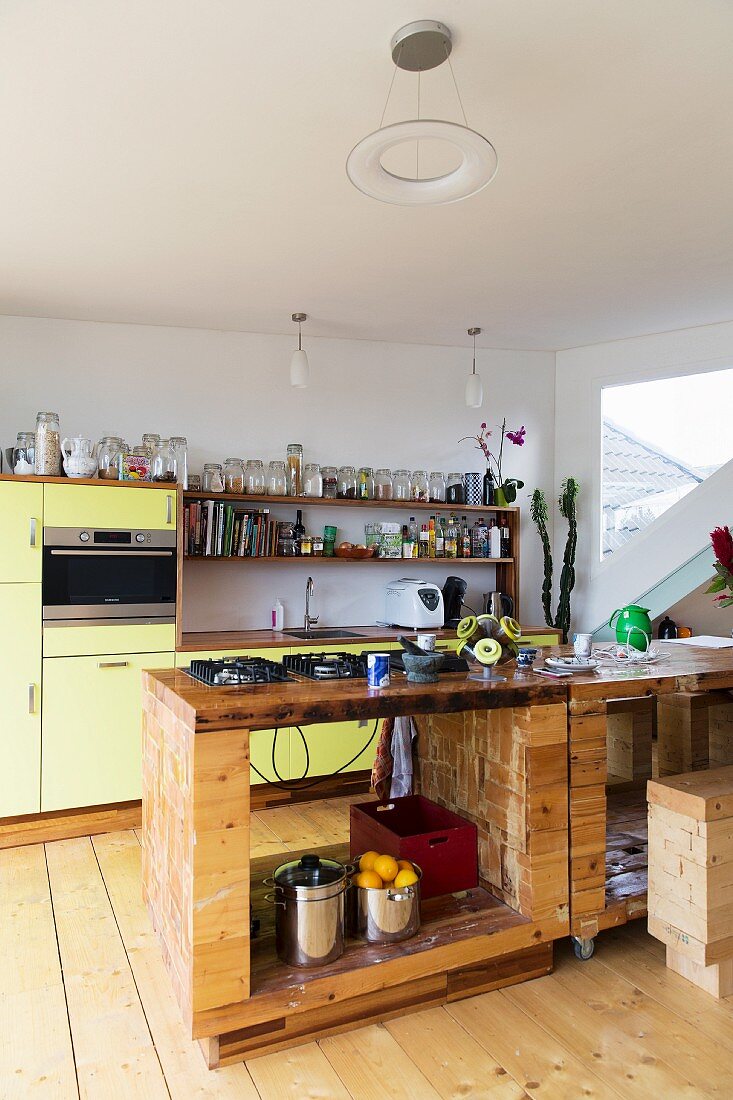 Island counter and yellow cabinet in kitchen