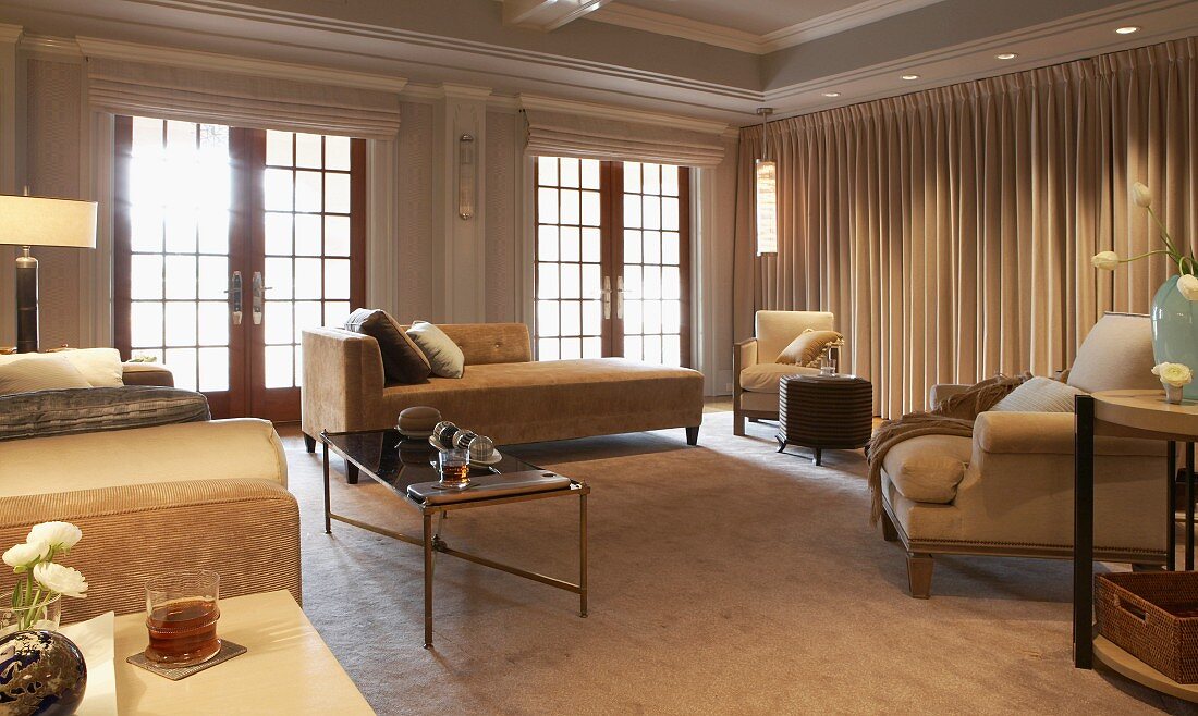 Elegant, comfortable living room with various sofas and armchairs