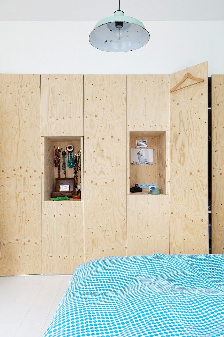 Custom, fitted plywood wardrobe with two open shelf niches for jewellery and other items