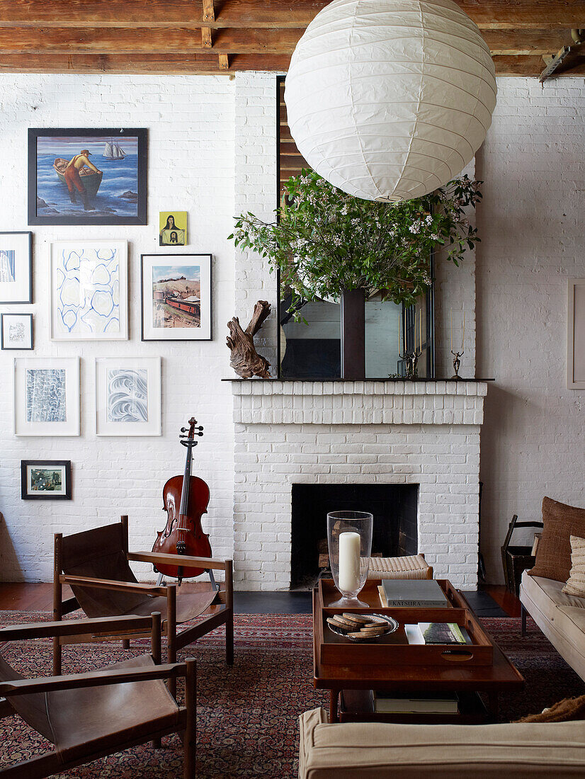 Living room in shades of brown with white-painted brick walls