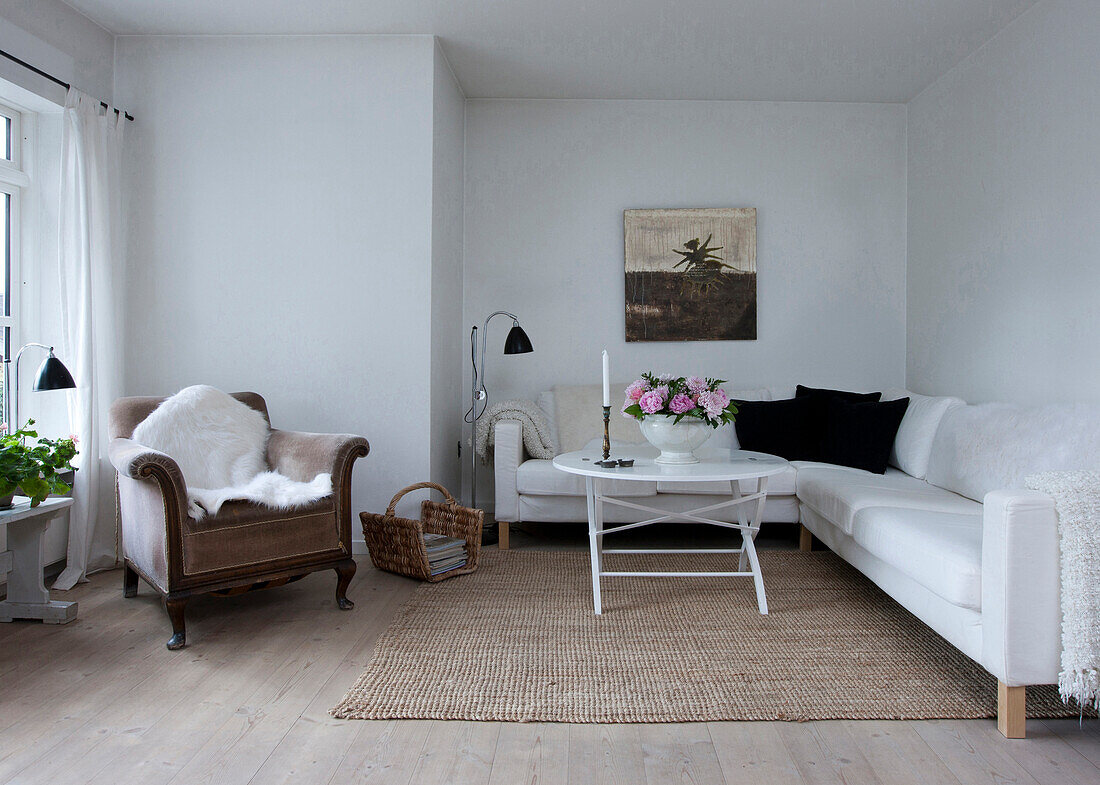 White corner sofa in niche in classic living room