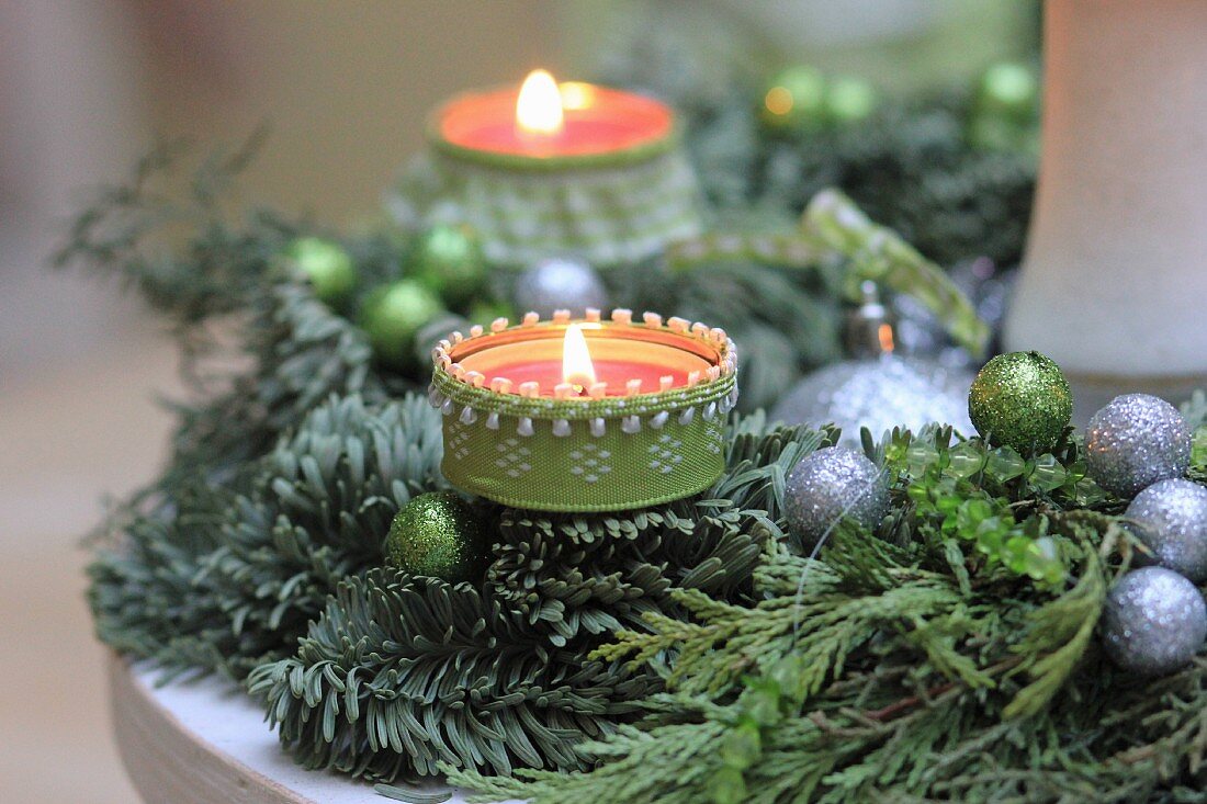 Advent wreath hand-decorated with green and silver baubles