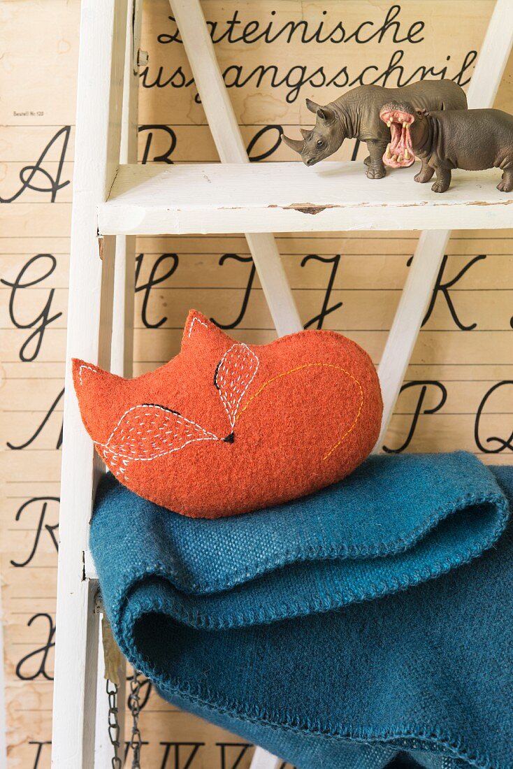 An embroidered fox made from fulled loden