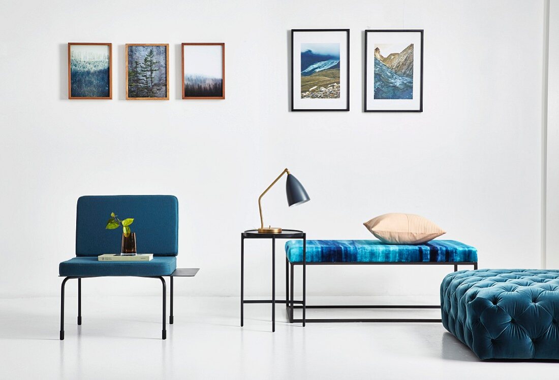 Furniture with slim frames and blue upholstery in white living room