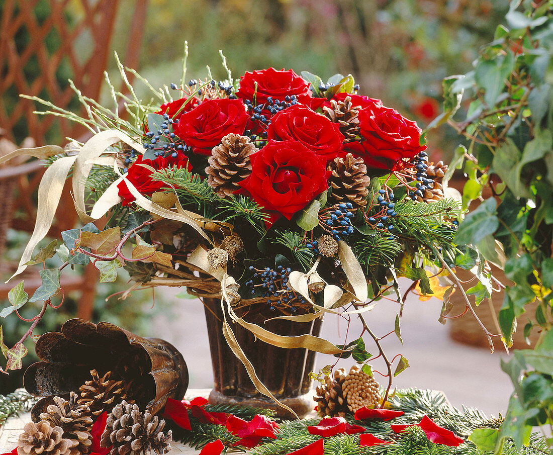 Bouquet of roses, twigs of Picea (spruce)
