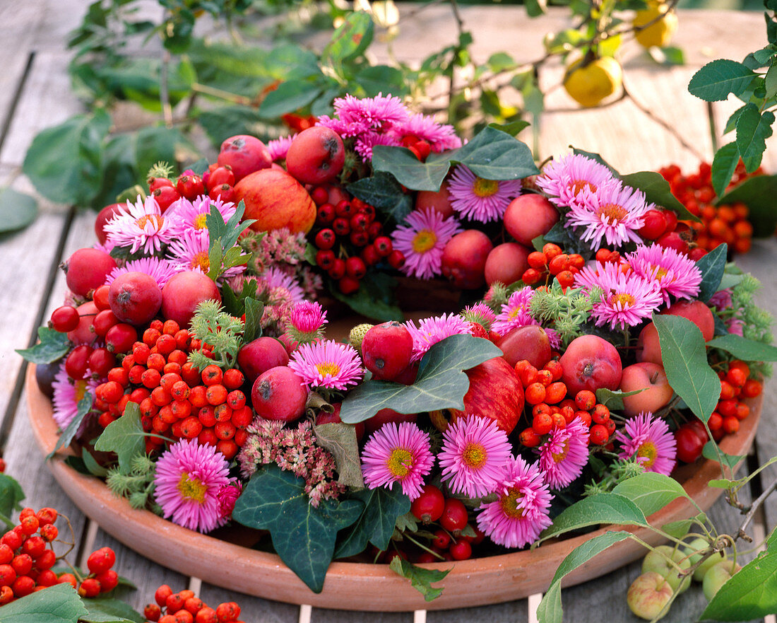 Aster flowers, berries and leaves wreath
