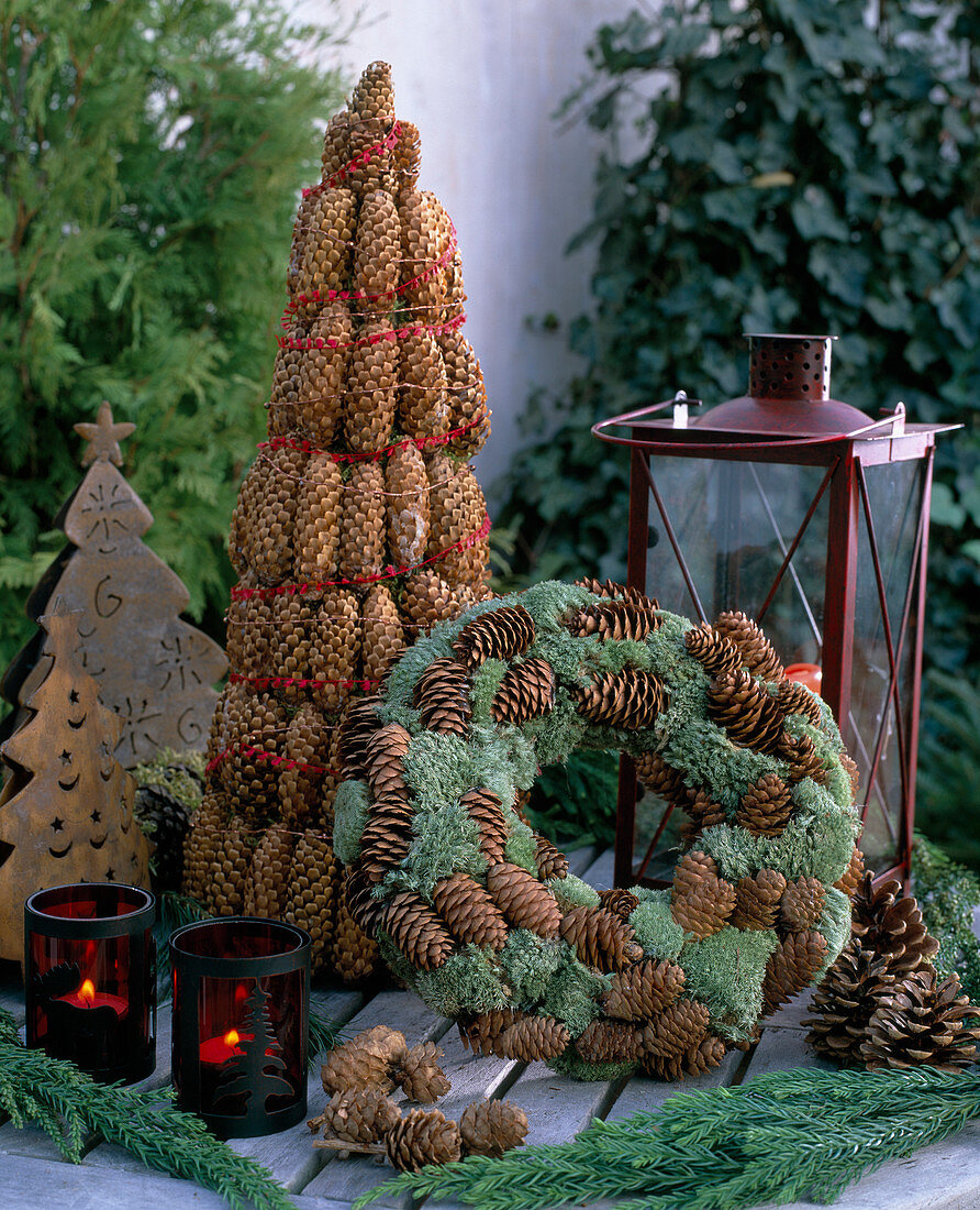 Pine pyramid made of Picea spruce cones as a pyramid and wreath