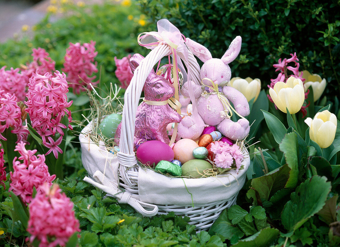 Easter basket with eggs and rabbits