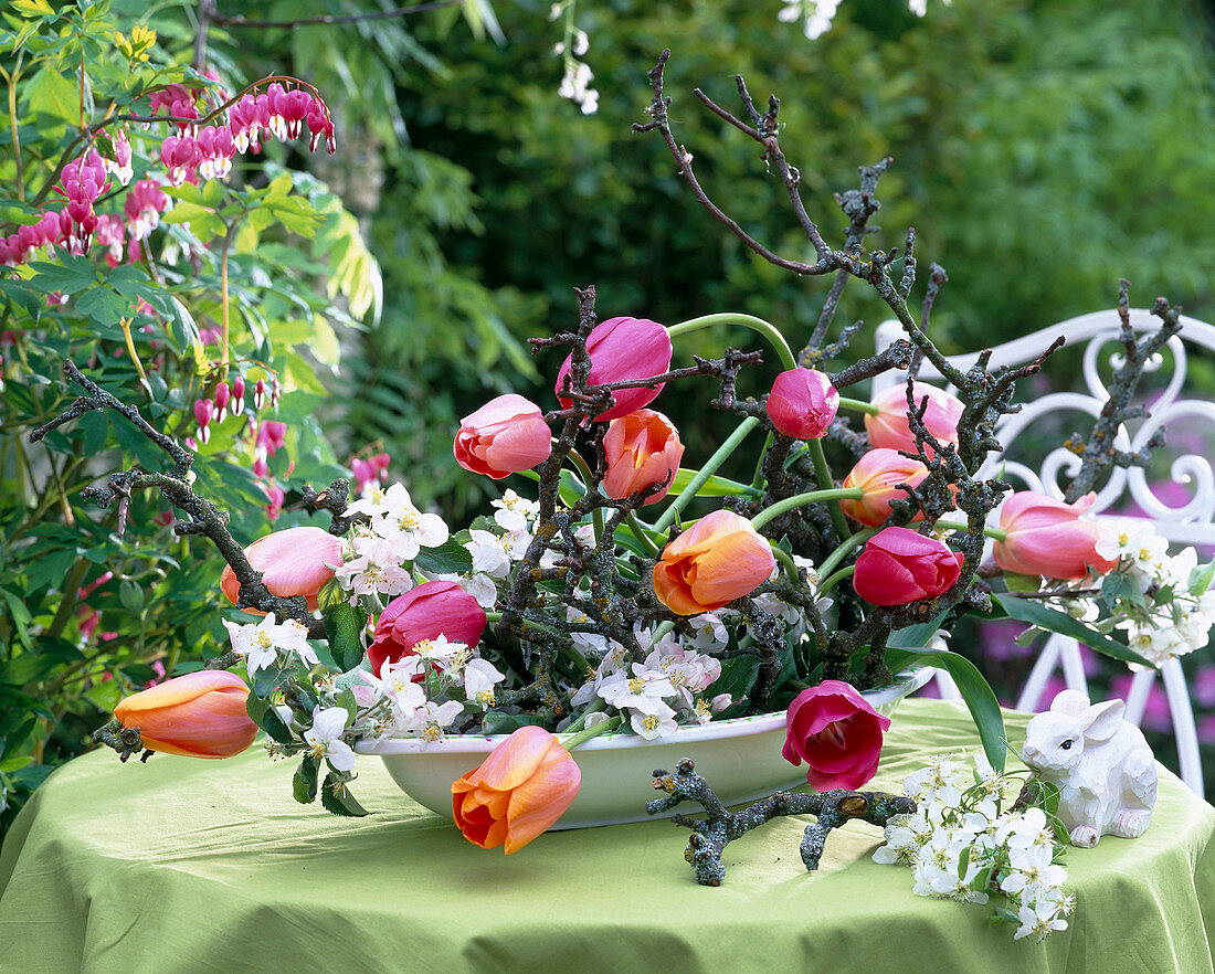 Arrangement of tulips and apple blossoms