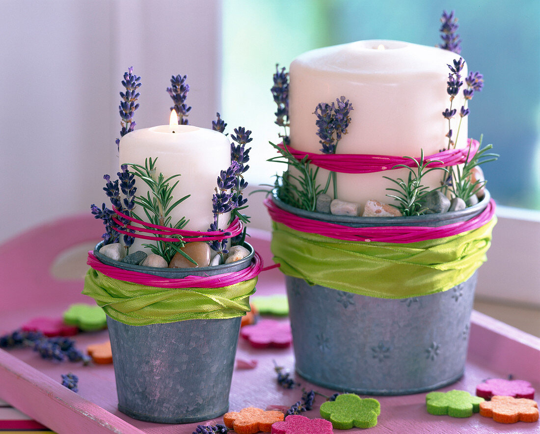 Candles in zinc pots decorated with lavandula (lavender)
