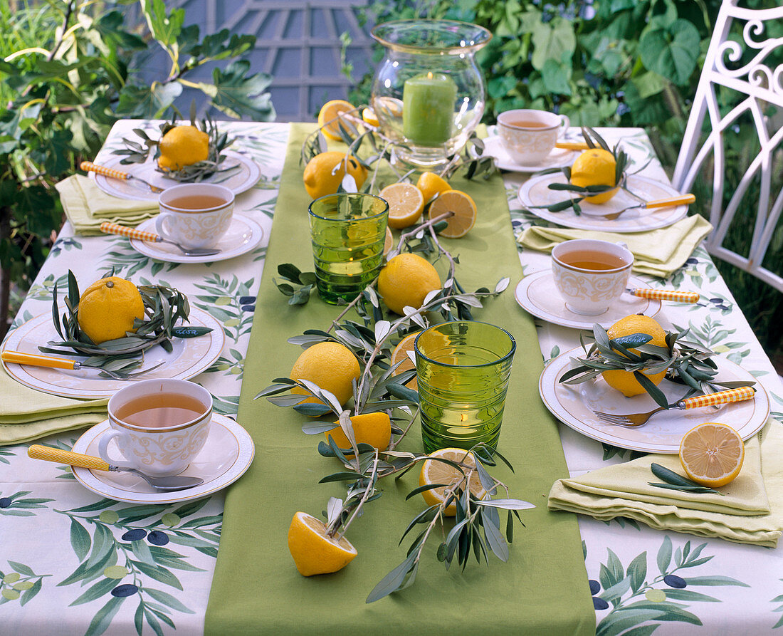 Table decoration with lemons and olives