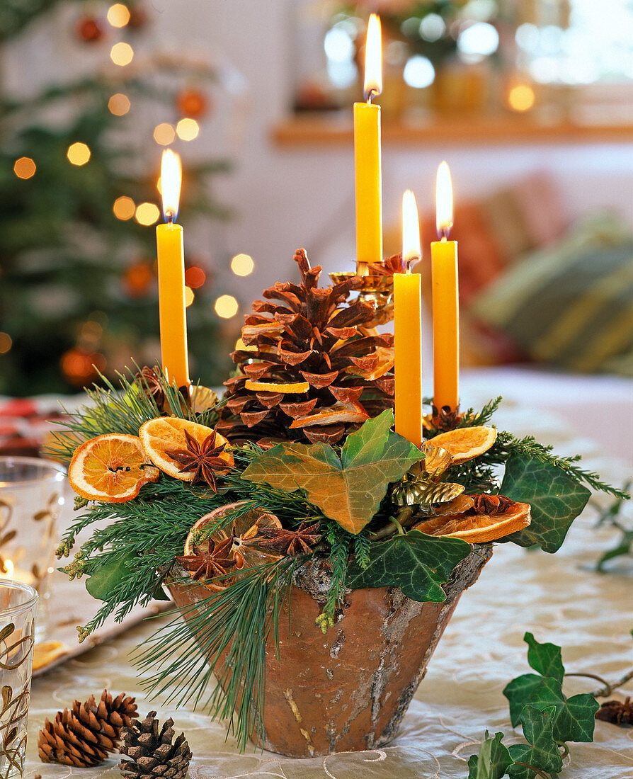 Unusual Advent wreath with honey-colored tree candles