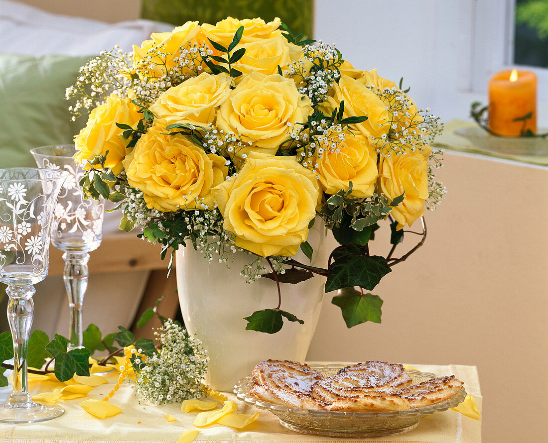 Yellow bouquet of roses with hedera and gypsophila