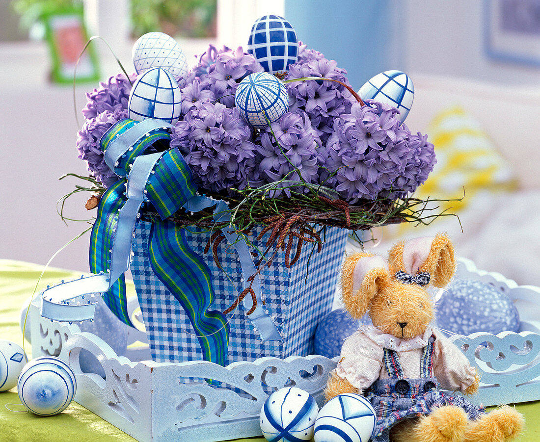 Easter bouquet of Hyacinthus in checkered square vase