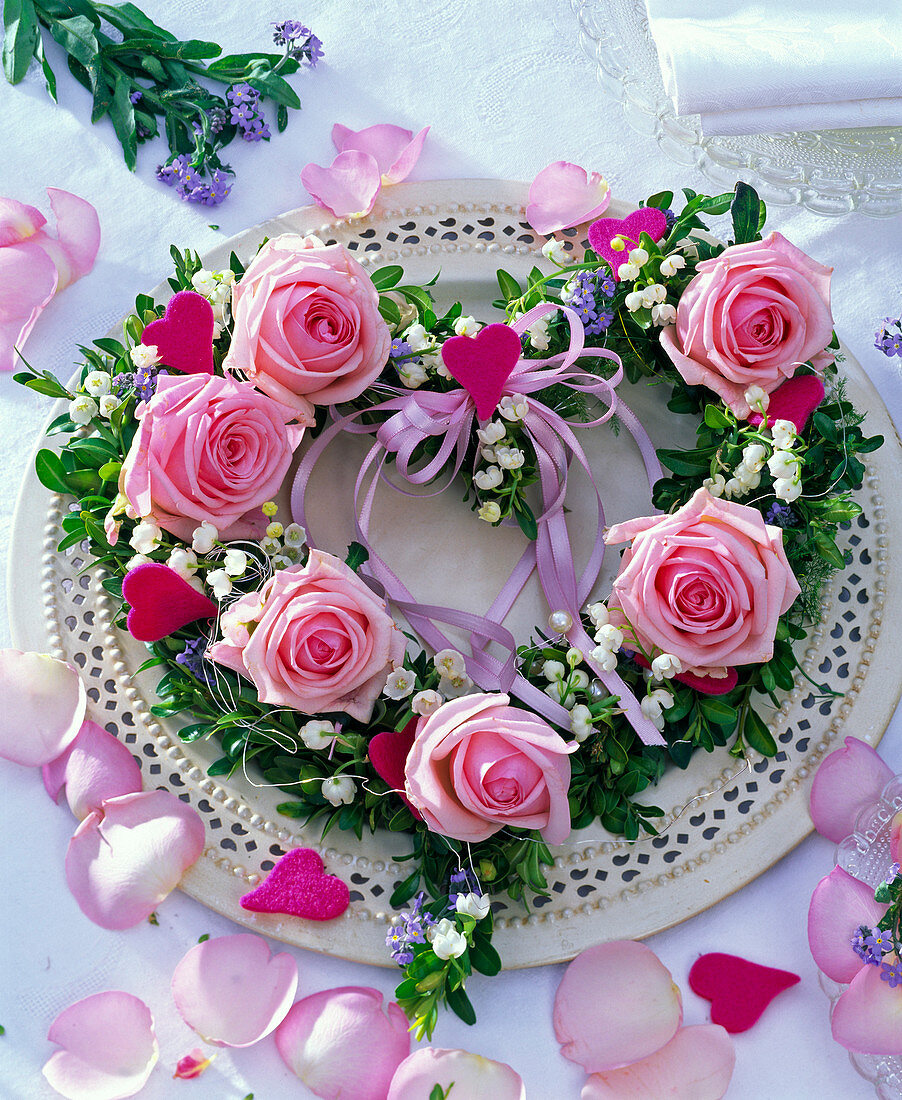 Heart shaped rose wreath, Convallaria (lily of the valley)
