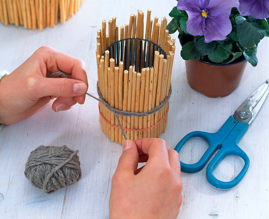 Decorate glasses with sticks of willow
