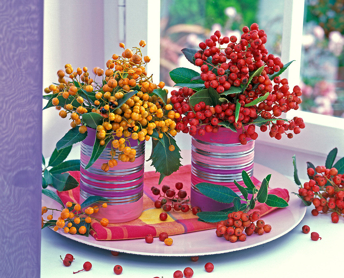Photinia bouquets with canned yellow and red berries