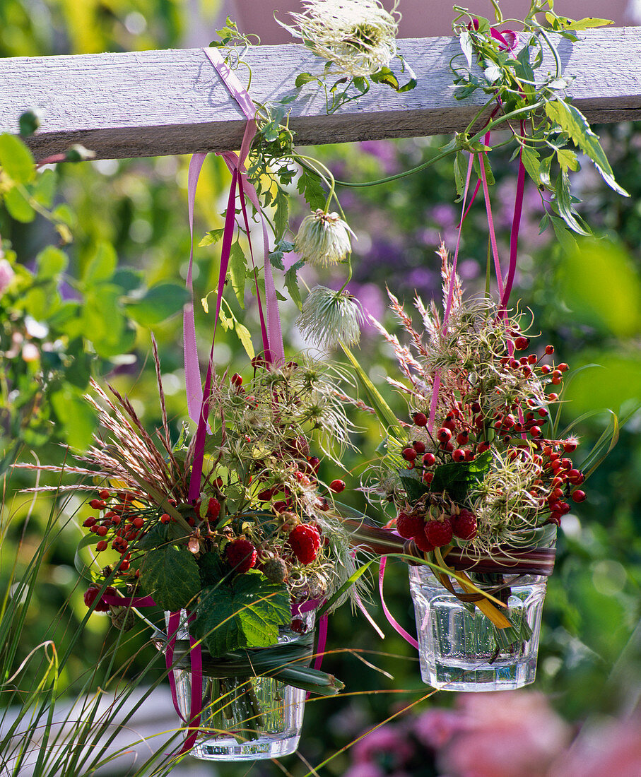 Small bouquets of miscanthus, rubus, rosehips