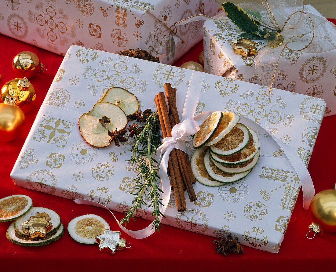 Gift with citrus (lime slices), cinnamon sticks