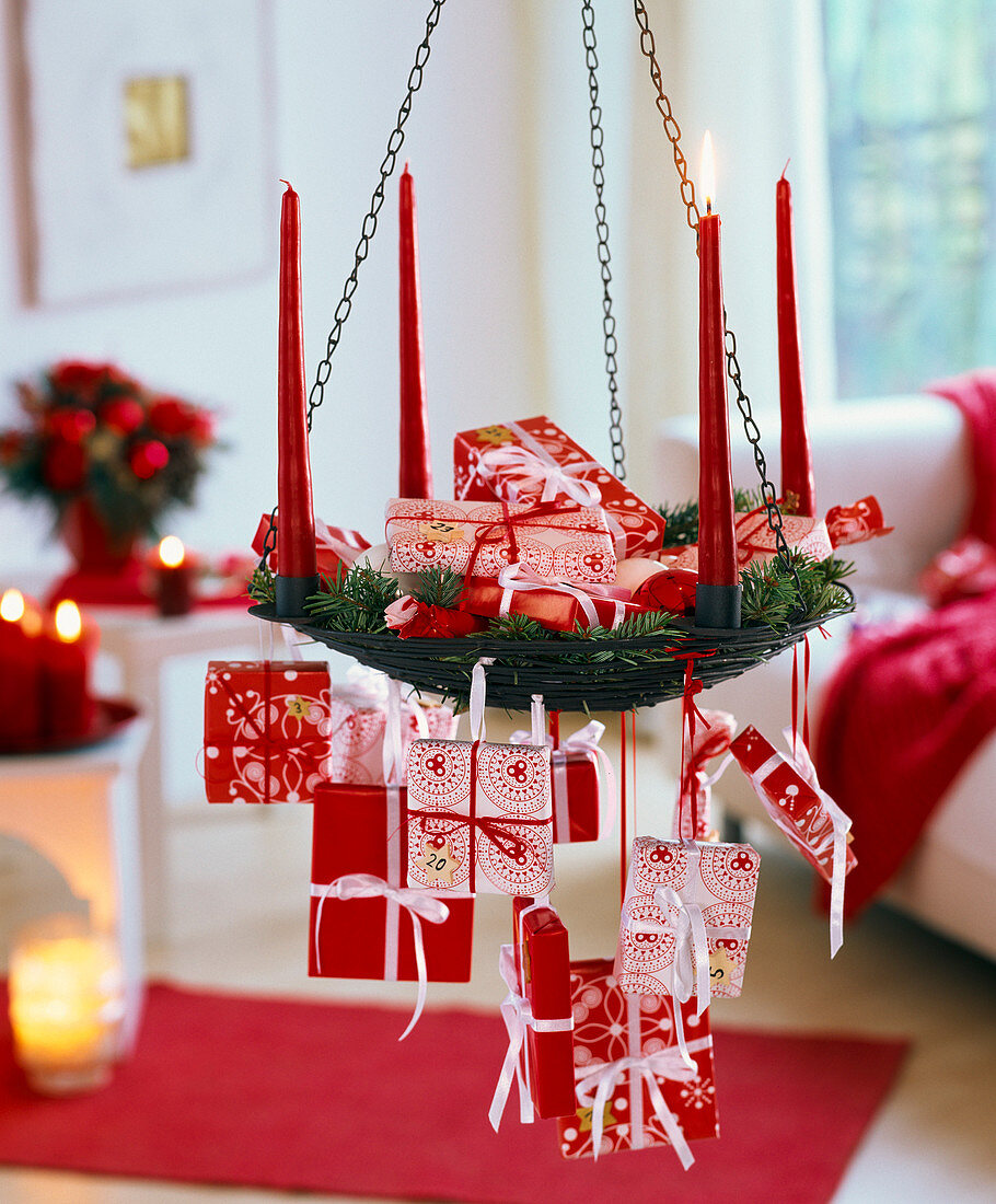 Hanging Christmas wreath with red and white parcel