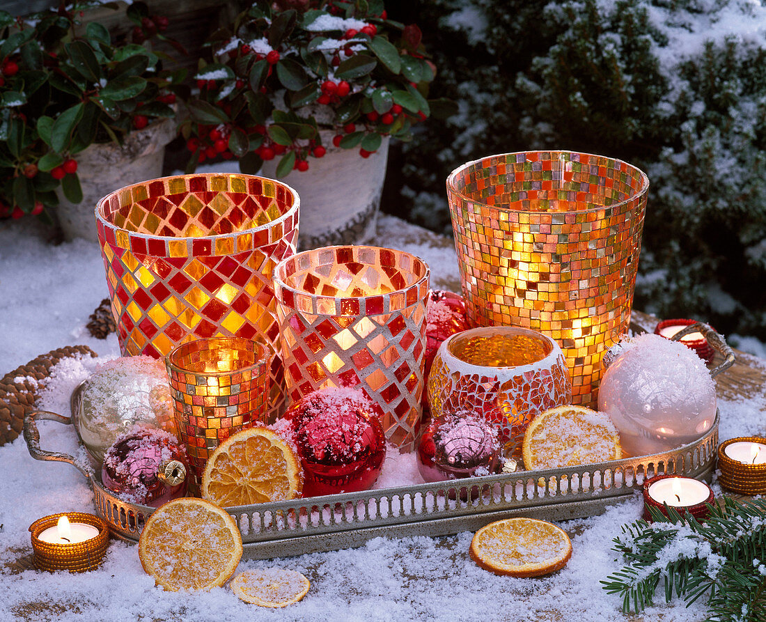 Mosaic glasses as lanterns with citrus