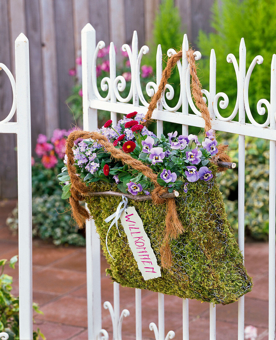 Moss bag with spring flowers