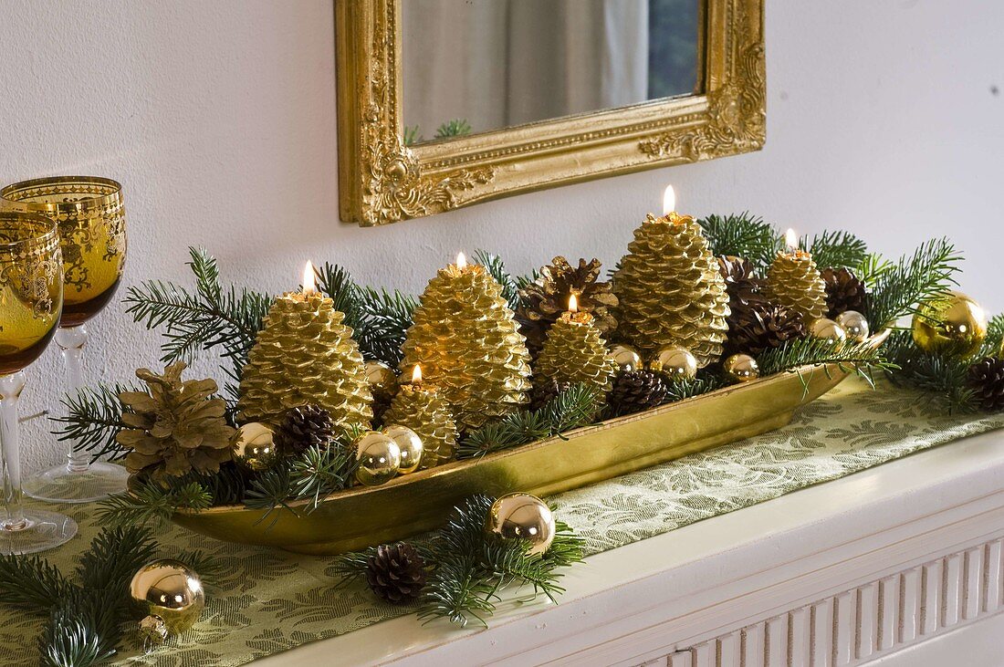 Advent arrangement in elongated gold bowl