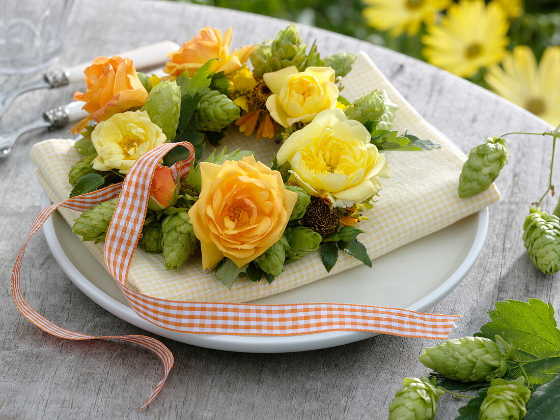 Yellow late summer roses and hops wreath