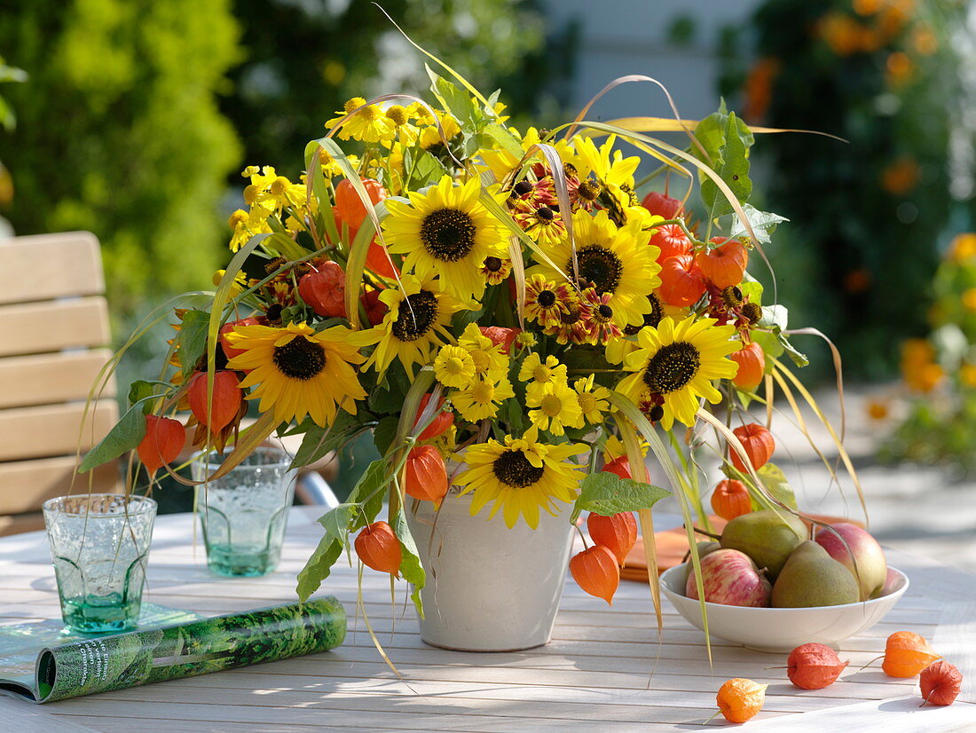Late summer bouquet with sunflowers and physalis