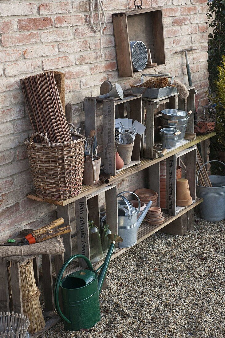 Pot place built from old wine crates and boards