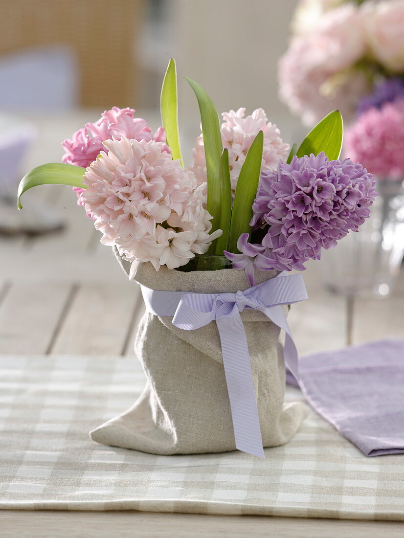 Small hyacinth bouquet in linen bag