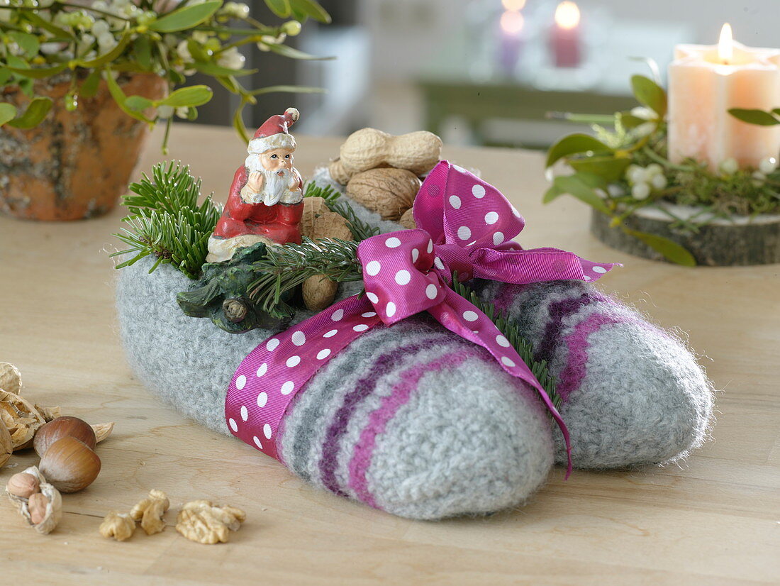 Felt slippers for Santa Claus, filled with nuts