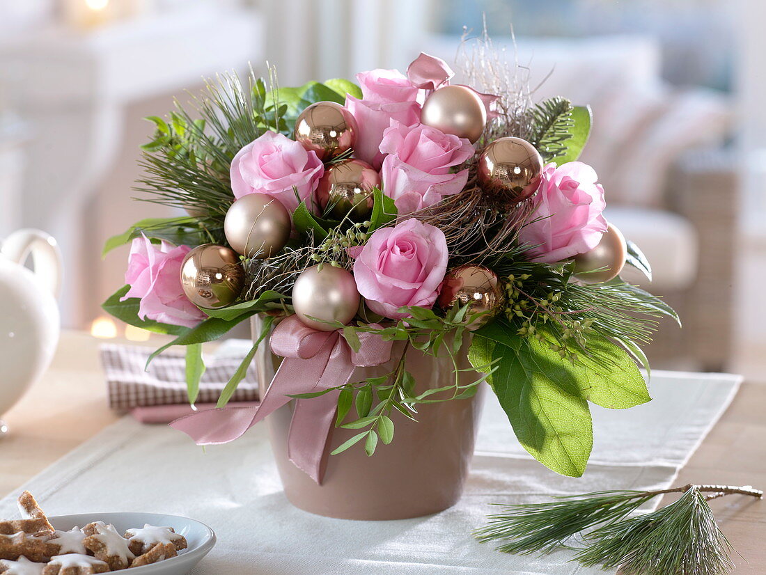 Christmas bouquet with pink (rose), pinus (pine), eucalyptus