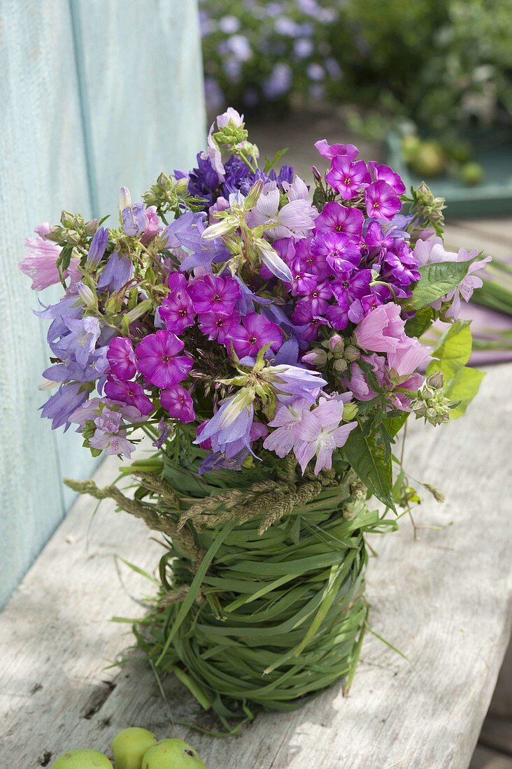 Glass wrapped in a glass as a vase