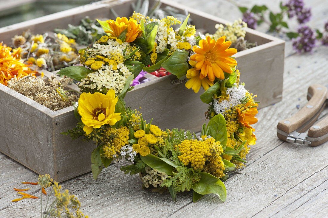 White and yellow wreath of herbs and medicinal herbs