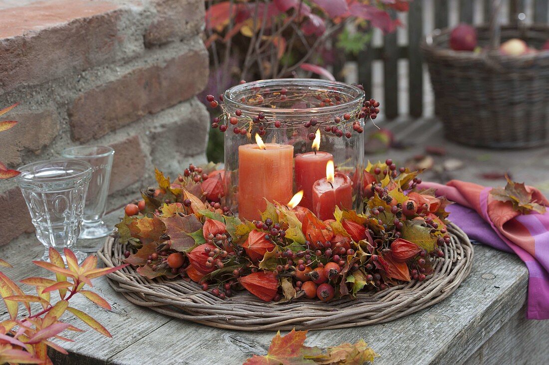 Autumn wreath of physalis (lantern fruit), rose (rosehip)
