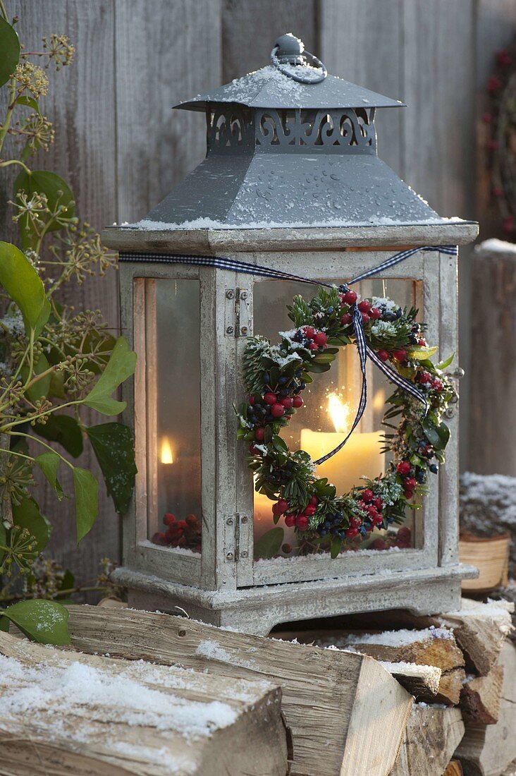 Lantern with a small wreath of Abies, Juniperus