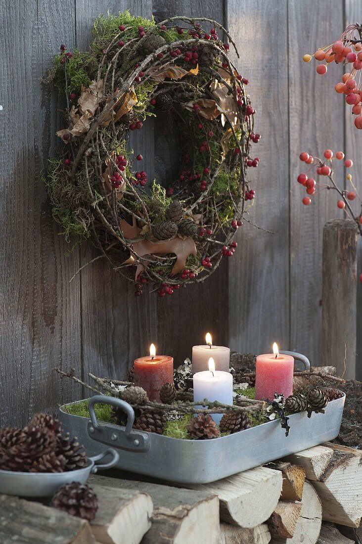 Natural Advent wreath with moss, twigs, cones and lichens