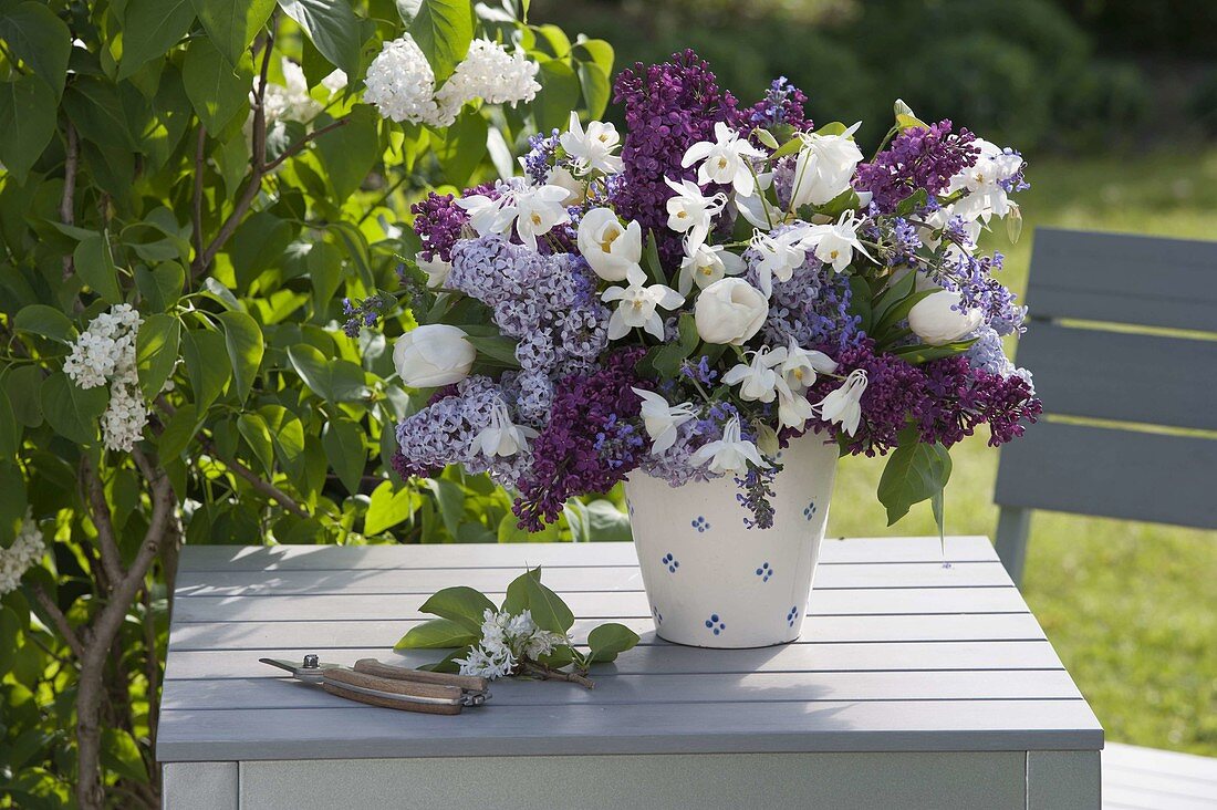 Woman planting a fragrant spring bouquet