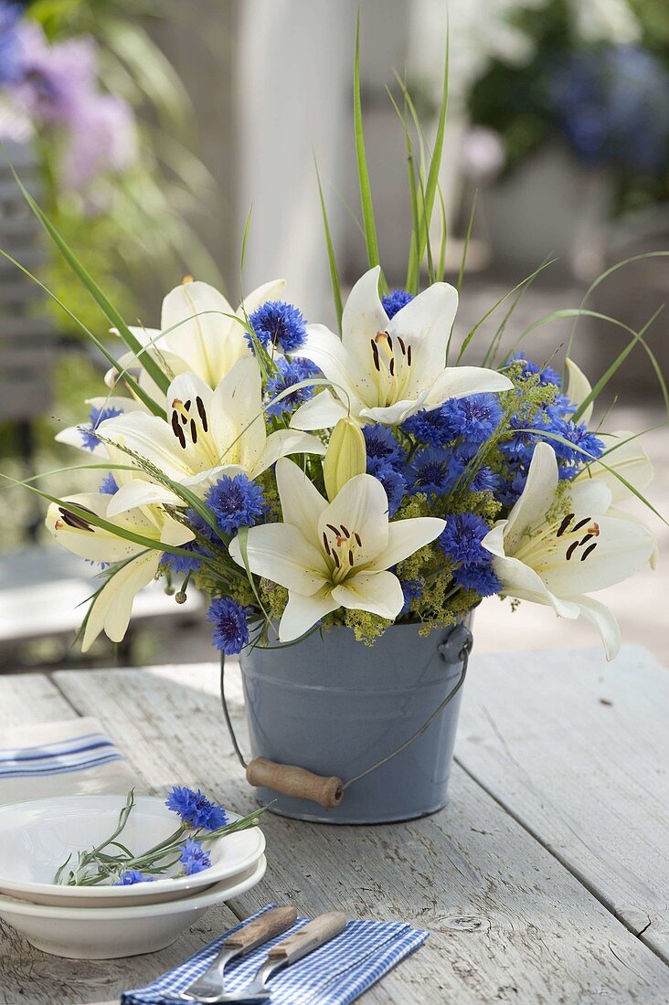 Blue and white bouquet with Lilium asiaticum, Centaurea cyanus