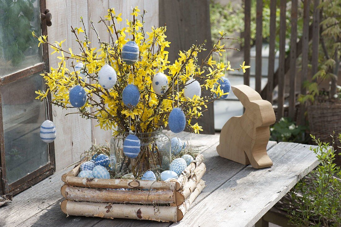 Easter bouquet with felt Easter eggs, Forsythia branches