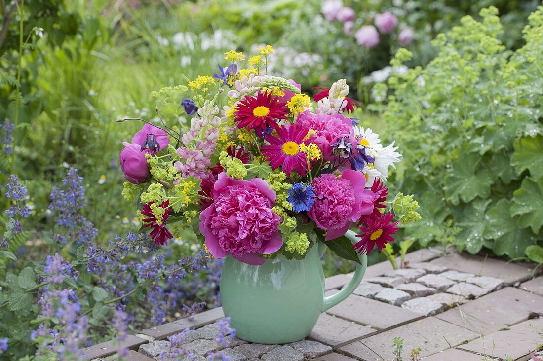 Colorful garden bouquet with peonies