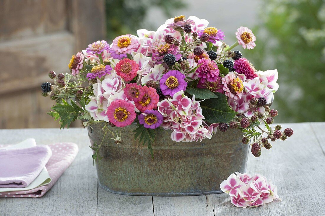 Late summer arrangement in tin jardiniere
