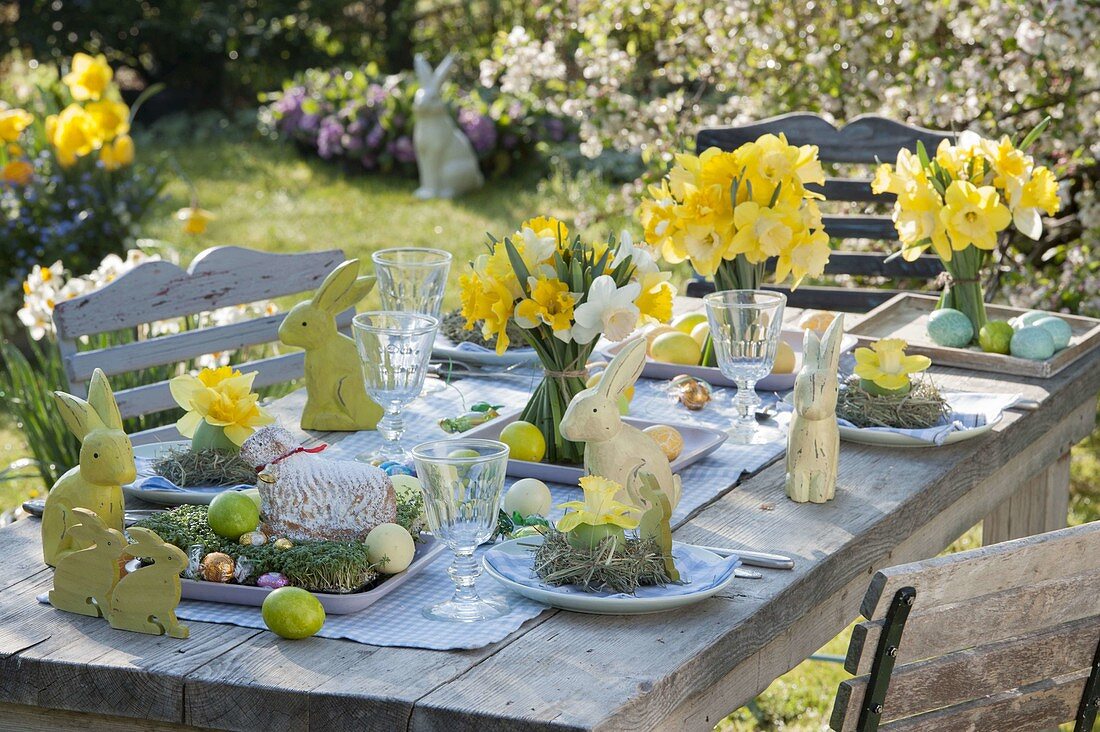 Covered Easter table with daffodils