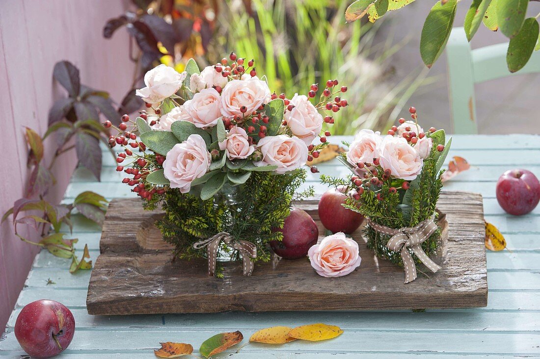 Small bouquets made of roses (rosehip) and sage (salvia)