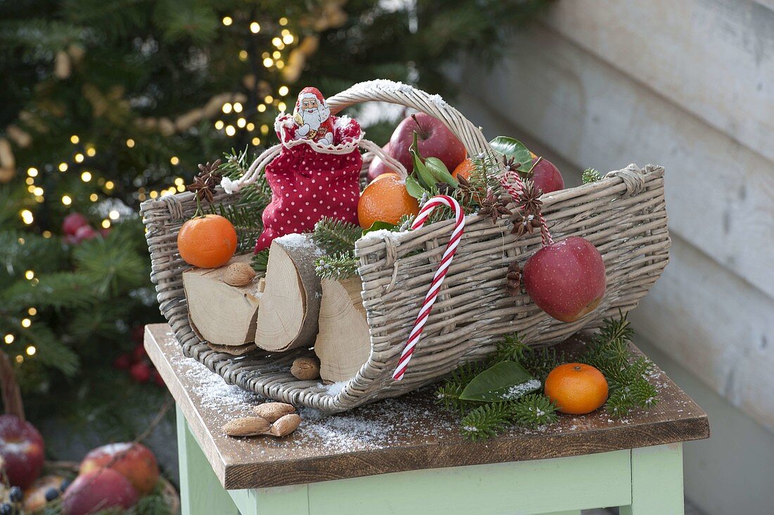 Firewood basket as a St. Nicholas surprise with St. Nicholas chocolates in a bag