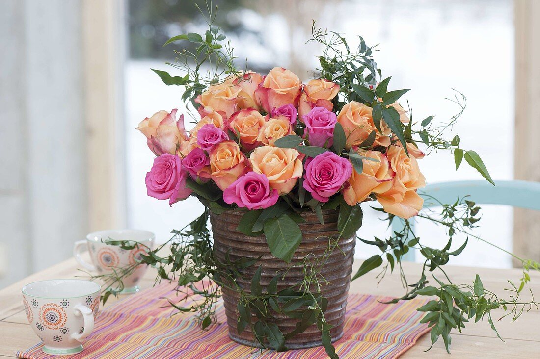 Bouquet made of pink (rose) and Jasminum polyanthum